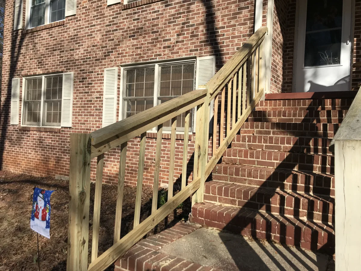 Wood deck stair support after rebuild