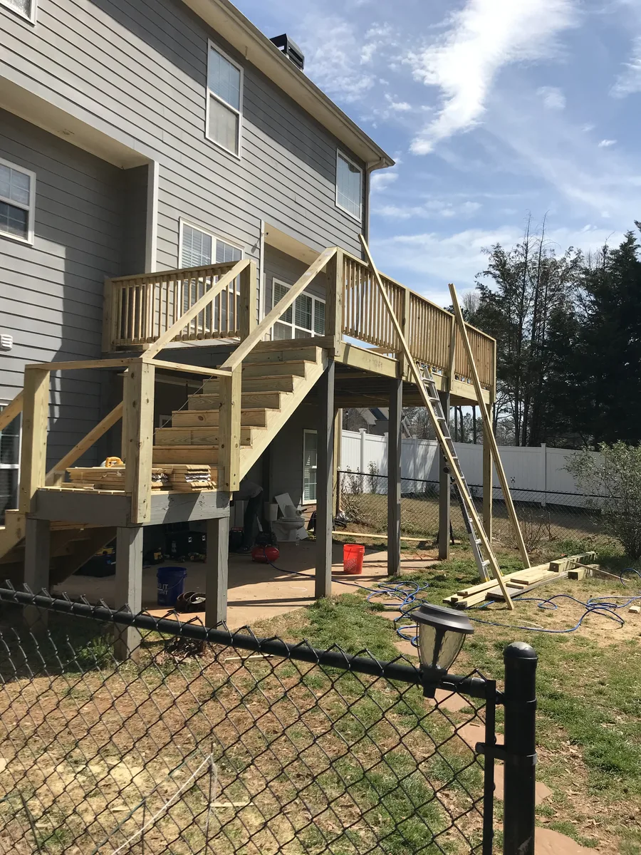 Custom wood deck construction and framing by Zenith