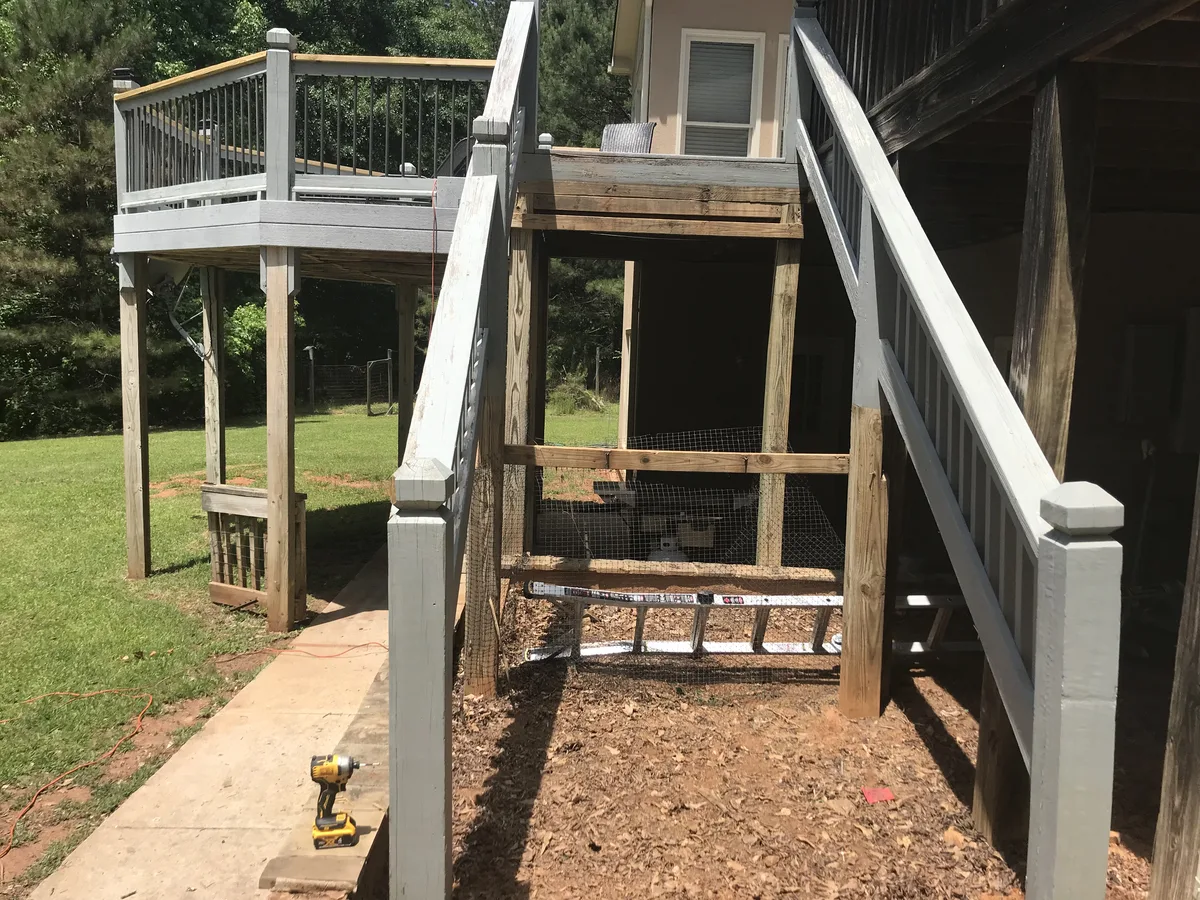 Weathered deck reconstruction, new support framing and posts